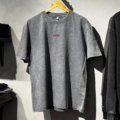 REMERA OVERSIZE GRIS BECOME BORDADO STONE WASH
